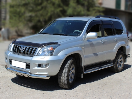 Toyota Land Cruiser Prado J120 2003-2009г.в.-Дуга передняя по низу бампера d-76 с доп.накладками (4 шт)